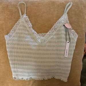 ANWND seamless spaghetti strap crop top sage green and white